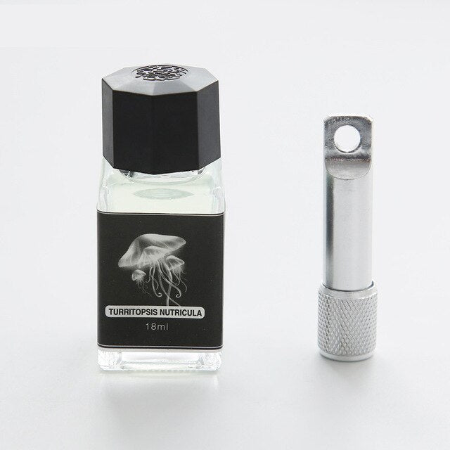 flacon d'encre transparente